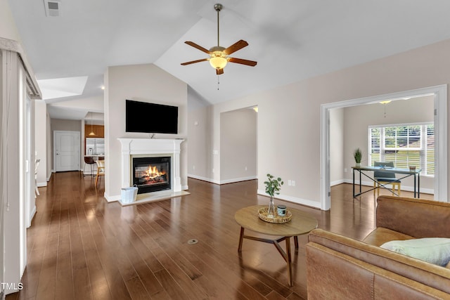 936 Blue Bird Ln, Wake Forest, NC 27587 - living room with a ceiling fan, vaulted ceiling, dark wood-style floors, and a glass covered fireplace