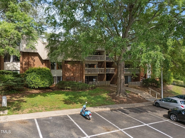 500 Umstead Dr Unit 103C, Chapel Hill, NC 27516 - view of building exterior with uncovered parking