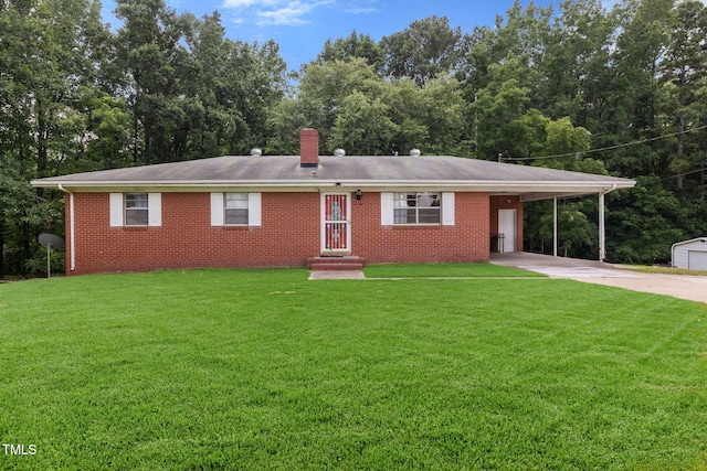 1319 Legend Rd, Raleigh, NC 27603 - ranch-style house featuring concrete driveway, an attached carport, a chimney, and a front yard
