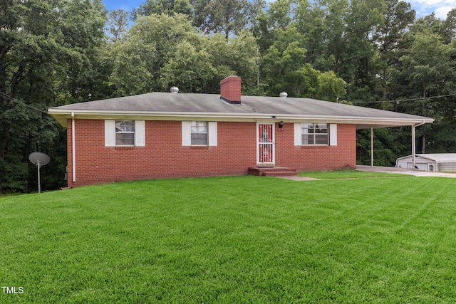 1319 Legend Rd, Raleigh, NC 27603 - ranch-style home with a front lawn, a chimney, brick siding, an attached carport, and a shingled roof