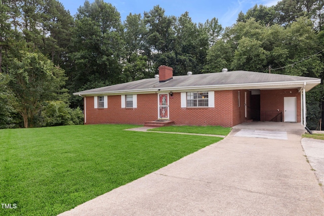 1319 Legend Rd, Raleigh, NC 27603 - single story home with concrete driveway, a front lawn, brick siding, a chimney, and a carport