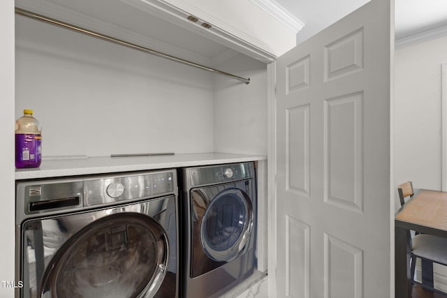 1319 Legend Rd, Raleigh, NC 27603 - laundry area with separate washer and dryer and crown molding