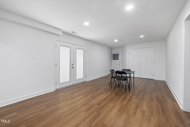 1319 Legend Rd, Raleigh, NC 27603 - dining room with french doors, wood finished floors, and recessed lighting
