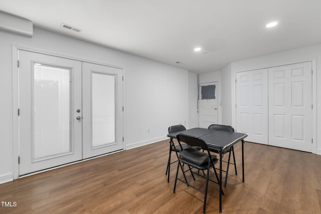 1319 Legend Rd, Raleigh, NC 27603 - dining area featuring french doors, wood finished floors, and recessed lighting