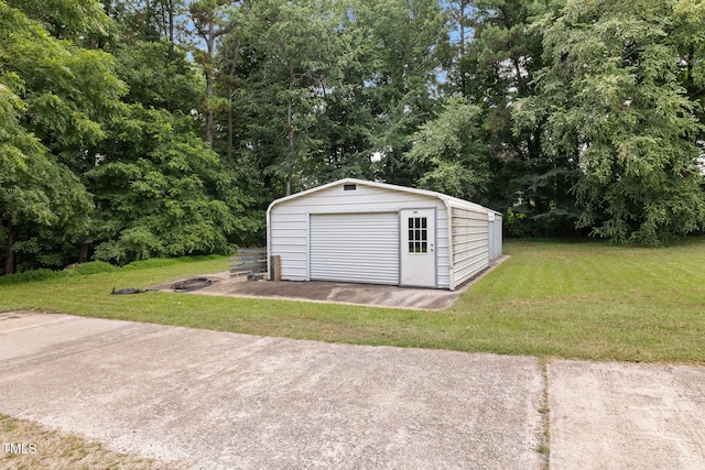1319 Legend Rd, Raleigh, NC 27603 - detached garage with view of wooded area