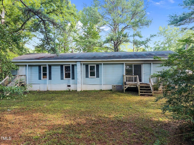 302 Allen Ave, Franklinton, NC 27525 - back of house with a deck, a yard, crawl space, and a shingled roof