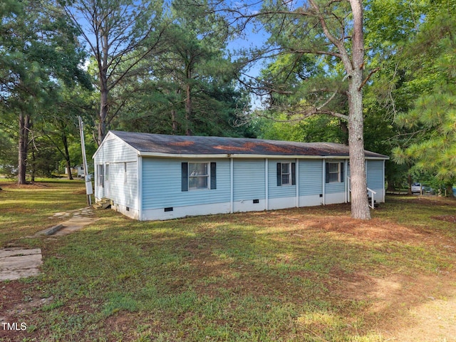 302 Allen Ave, Franklinton, NC 27525 - view of front of property with crawl space, a front lawn, and a shingled roof