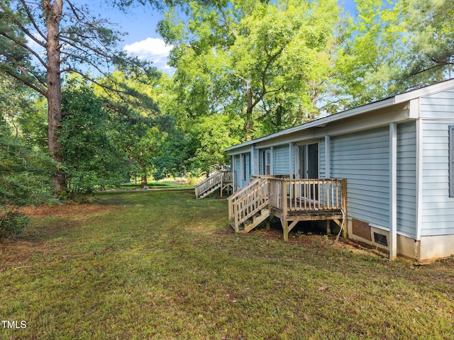 302 Allen Ave, Franklinton, NC 27525 - view of green lawn with a deck