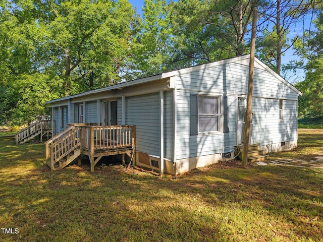 302 Allen Ave, Franklinton, NC 27525 - back of property featuring crawl space, a deck, entry steps, a yard, and stairs
