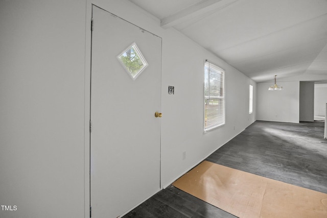 302 Allen Ave, Franklinton, NC 27525 - entrance foyer with a chandelier, vaulted ceiling, and dark wood-style flooring