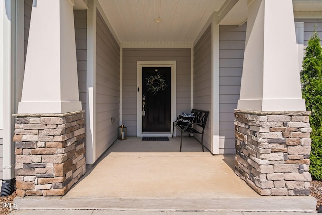 1066 Bingley Dr, Durham, NC 27703 - view of exterior entry with a porch
