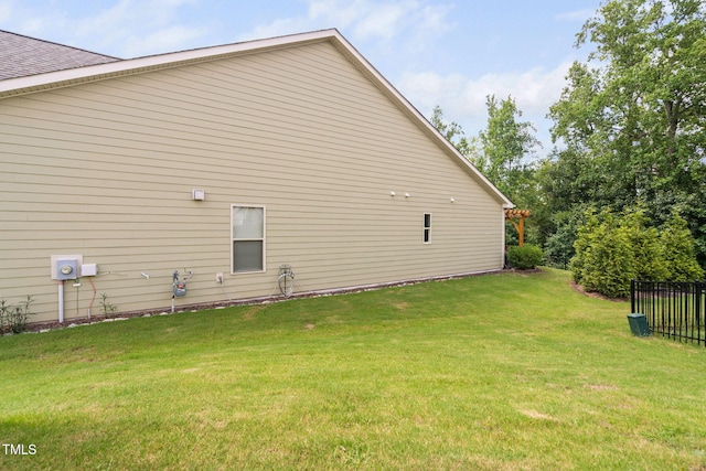 1066 Bingley Dr, Durham, NC 27703 - view of side of home with a yard