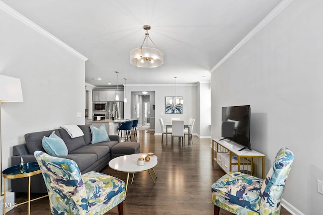 1066 Bingley Dr, Durham, NC 27703 - living area featuring a chandelier, dark wood-style floors, and crown molding