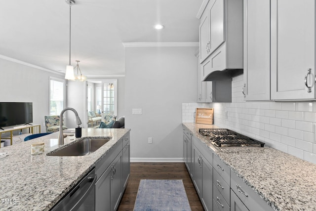 1066 Bingley Dr, Durham, NC 27703 - kitchen featuring stainless steel gas stovetop, open floor plan, ornamental molding, light stone countertops, and dishwasher