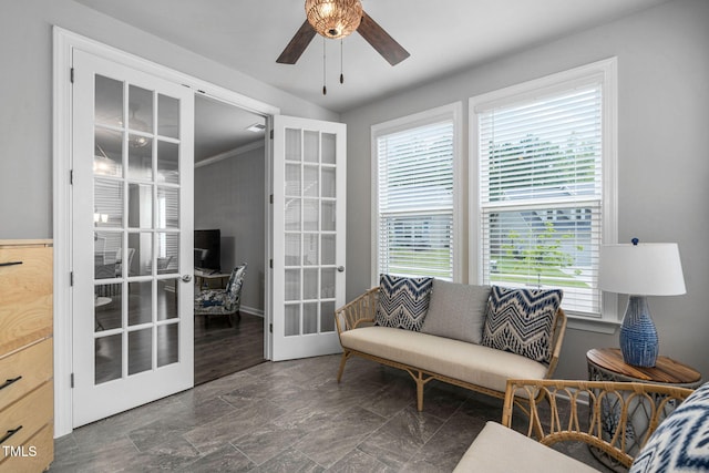 1066 Bingley Dr, Durham, NC 27703 - living area with french doors, ceiling fan, and stone finish flooring