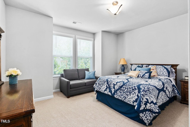 1066 Bingley Dr, Durham, NC 27703 - carpeted bedroom with baseboards