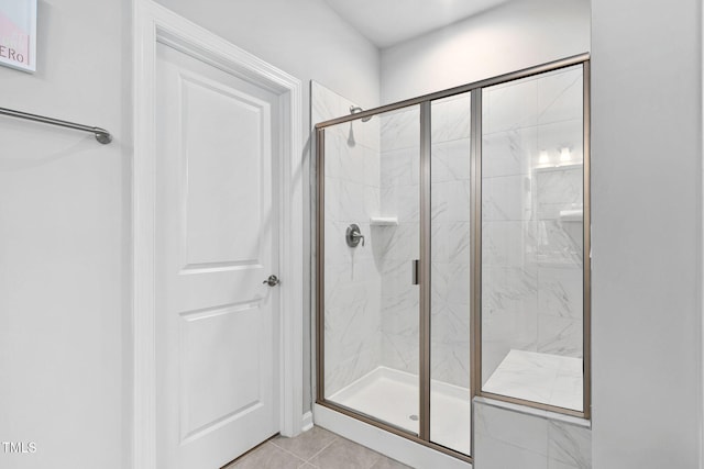 1066 Bingley Dr, Durham, NC 27703 - full bath featuring a marble finish shower and tile patterned floors