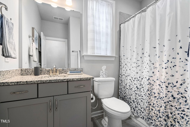 1066 Bingley Dr, Durham, NC 27703 - bathroom featuring vanity, tile patterned floors, and curtained shower