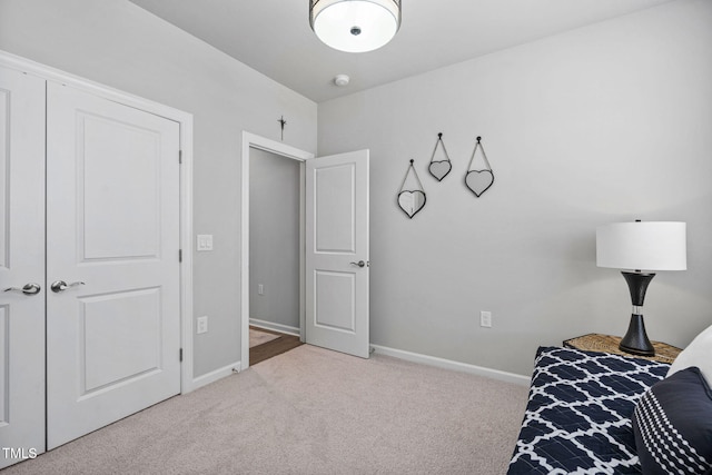 1066 Bingley Dr, Durham, NC 27703 - bedroom with carpet floors and baseboards