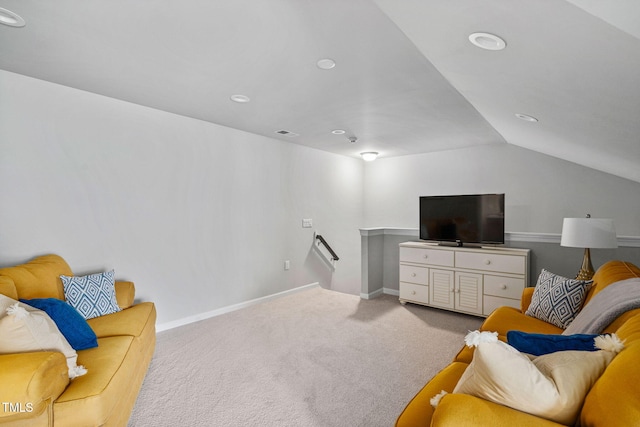 1066 Bingley Dr, Durham, NC 27703 - carpeted living area with lofted ceiling and recessed lighting