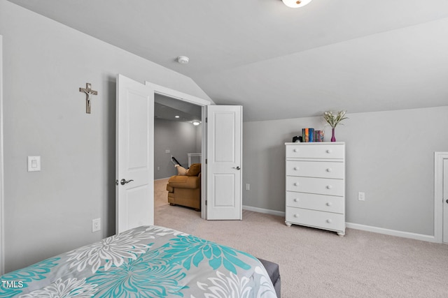 1066 Bingley Dr, Durham, NC 27703 - bedroom featuring lofted ceiling and light carpet
