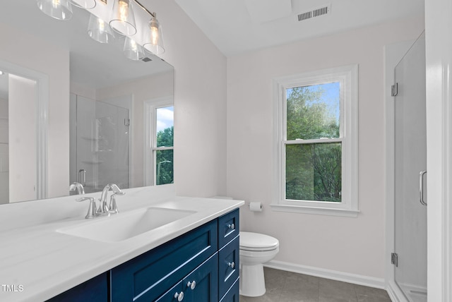 7 Nadeau Ct, Durham, NC 27704 - bathroom with vanity, a stall shower, and tile patterned flooring