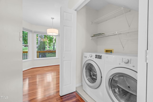 7 Nadeau Ct, Durham, NC 27704 - washroom featuring washing machine and clothes dryer and wood finished floors