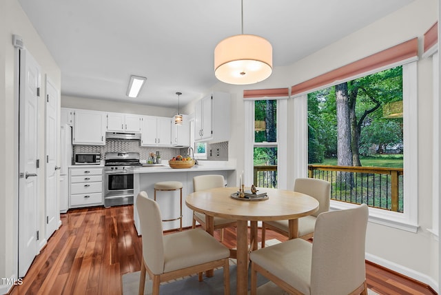 7 Nadeau Ct, Durham, NC 27704 - dining space featuring wood finished floors and baseboards