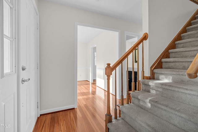 7 Nadeau Ct, Durham, NC 27704 - foyer featuring stairway and wood finished floors