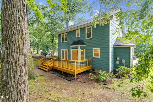 7 Nadeau Ct, Durham, NC 27704 - back of property with a wooden deck, a chimney, roof with shingles, and crawl space