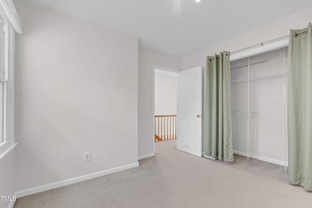 7 Nadeau Ct, Durham, NC 27704 - unfurnished bedroom featuring carpet floors and a closet