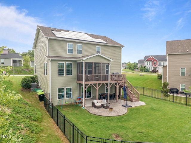1304 Bromby Ave, Knightdale, NC 27545 - rear view of house with a patio, a fenced backyard, stairs, a sunroom, and a wooden deck