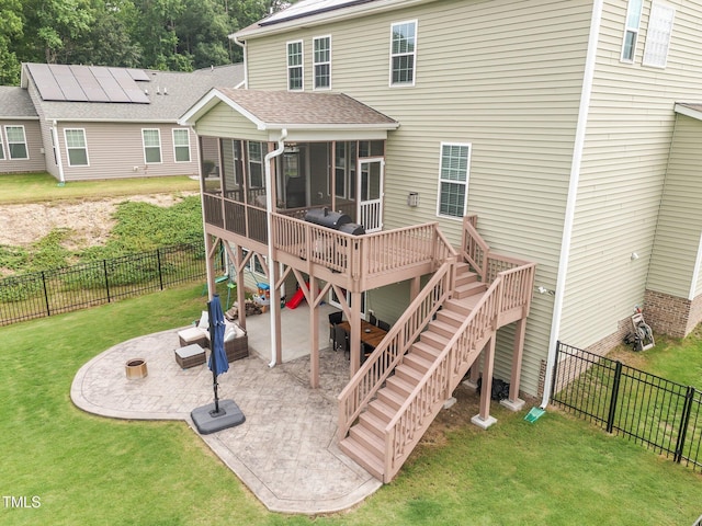 1304 Bromby Ave, Knightdale, NC 27545 - back of house with a sunroom, a patio, stairway, and a fenced backyard