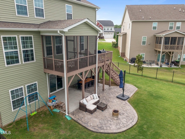 1304 Bromby Ave, Knightdale, NC 27545 - back of house featuring a sunroom, a patio, a shingled roof, an outdoor hangout area, and a wooden deck