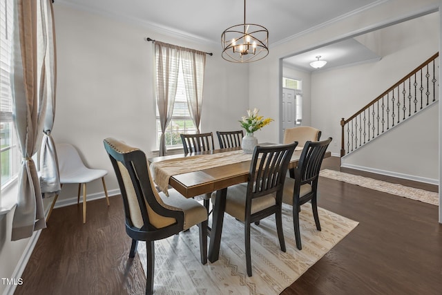 1304 Bromby Ave, Knightdale, NC 27545 - dining room featuring a chandelier, stairs, ornamental molding, and wood finished floors