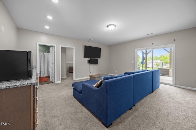 1304 Bromby Ave, Knightdale, NC 27545 - carpeted living area with baseboards and recessed lighting