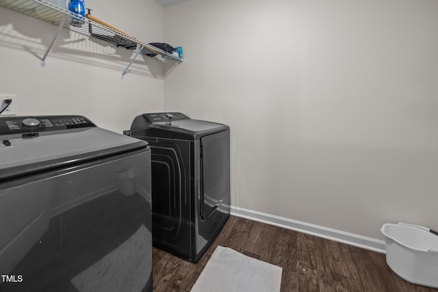 1304 Bromby Ave, Knightdale, NC 27545 - washroom with independent washer and dryer and dark wood finished floors