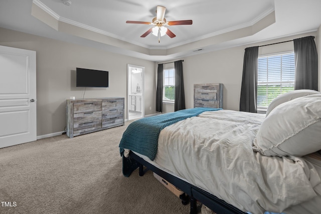 1304 Bromby Ave, Knightdale, NC 27545 - bedroom with a raised ceiling, crown molding, carpet, connected bathroom, and ceiling fan