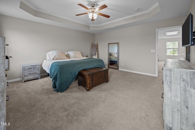 1304 Bromby Ave, Knightdale, NC 27545 - carpeted bedroom with a tray ceiling, crown molding, and ceiling fan
