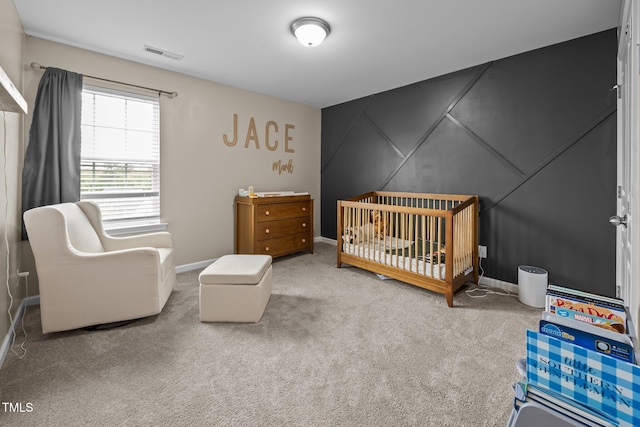 1304 Bromby Ave, Knightdale, NC 27545 - carpeted bedroom featuring a nursery area and baseboards