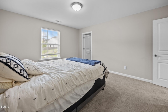 1304 Bromby Ave, Knightdale, NC 27545 - bedroom featuring baseboards and carpet
