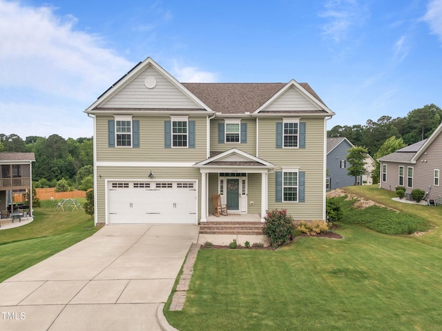1304 Bromby Ave, Knightdale, NC 27545 - view of front of property with driveway, a garage, a front yard, a porch, and roof with shingles