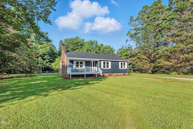 104 S Nikol Way, Clayton, NC 27520 - view of front of property with a chimney, roof with shingles, and a wooden deck