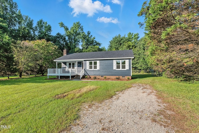 104 S Nikol Way, Clayton, NC 27520 - ranch-style house with crawl space, a front yard, a chimney, driveway, and a deck