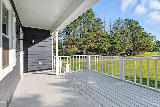 104 S Nikol Way, Clayton, NC 27520 - wooden terrace with a lawn and view of wooded area