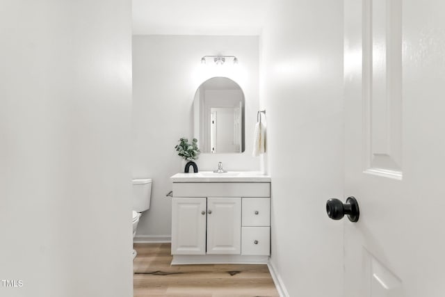 104 S Nikol Way, Clayton, NC 27520 - bathroom featuring vanity and wood finished floors