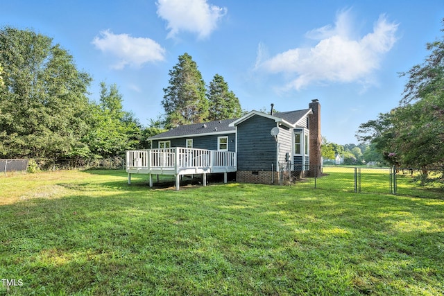104 S Nikol Way, Clayton, NC 27520 - rear view of house with a chimney, a wooden deck, a fenced backyard, and crawl space