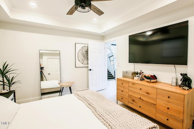 1523 Ivy Ln, Raleigh, NC 27609 - bedroom with a tray ceiling, ornamental molding, recessed lighting, and ceiling fan