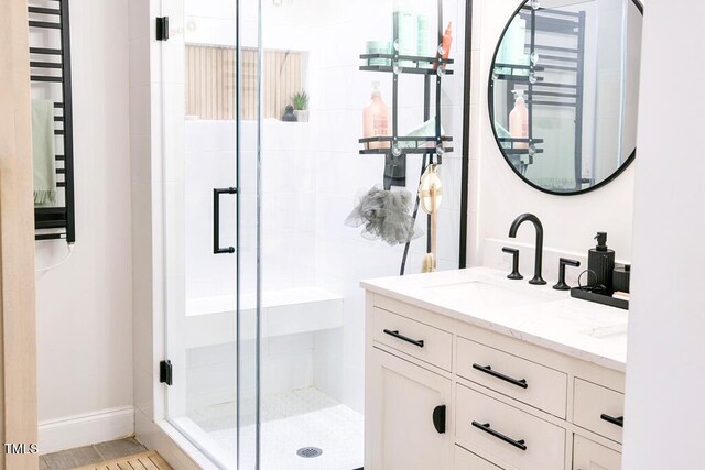 1523 Ivy Ln, Raleigh, NC 27609 - bathroom featuring a shower stall and vanity