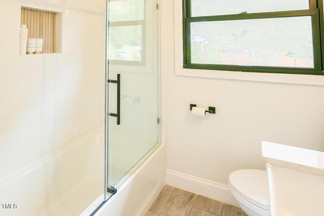 1523 Ivy Ln, Raleigh, NC 27609 - bathroom featuring toilet and enclosed tub / shower combo